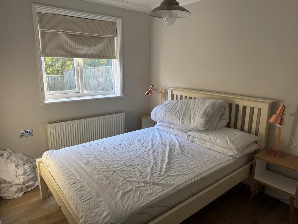 Lot: 6 - TWO-BEDROOM HOLIDAY BUNGALOW - The larger of the two bedrooms